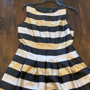 Black, white, gold sleeveless dress